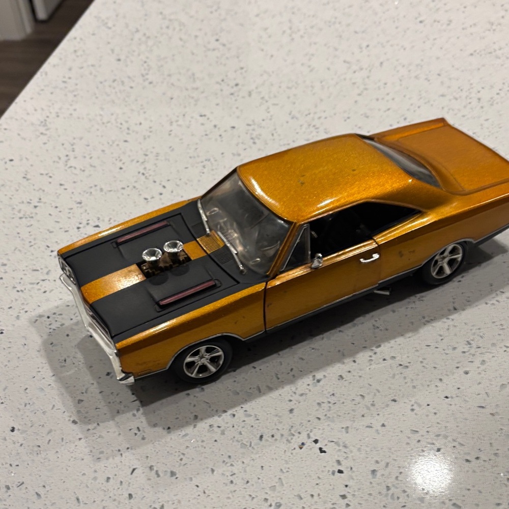Gold and Black Diecast Model Car
